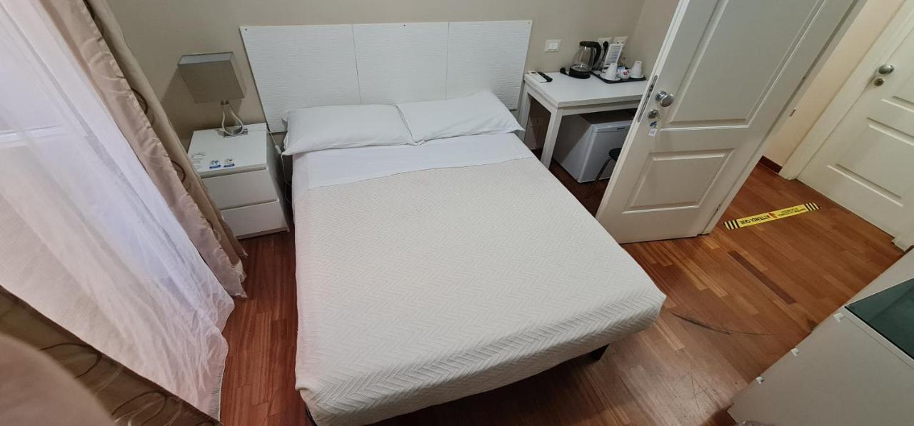 มาร์ติโน ไอ มอนติ Hotel โรม ห้อง รูปภาพ
